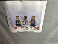 Full view of the Kenneth Gatewood print showing three children in basketball jerseys sitting on a bench, two basketballs on the floor, with some creasing visible in the paper.