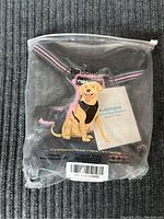 Harness in original plastic packaging with label showing brand and product type.