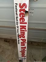 Box of Steel King Pin Tripod featuring brand name and tagline 'Fastest set-up of any tripod made'.