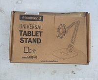 Box labeled Bontend Universal Tablet Stand, model BS-03.
