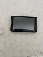 Front view of Garmin nüvi GPS device showing touchscreen and Garmin logo.
