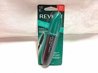 Front view of sealed Revlon Super Length mascara in original packaging with teal and black design.