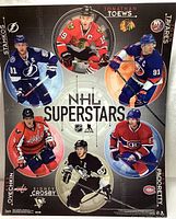 Full view of the complete NHL Superstars poster with all player images visible.