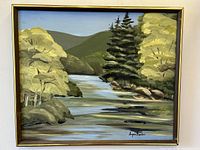 Full image of framed landscape oil painting showing entire composition of river, trees, hills and sky.