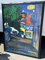 Full front view of the large framed art print showing the colorful abstract house and tree with Kandinsky signature in the bottom right.