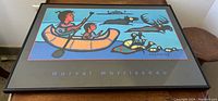 Framed Norval Morrisseau art poster shown from front.