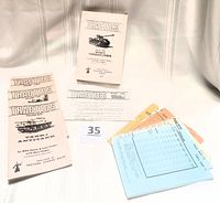 Full lot displayed includes the three volume booklets, the original box, colored game sheets, spare parts, and an instruction sheet.