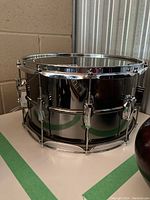 Side view of drum showing chrome shell and lugs