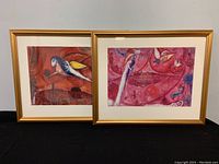 Two framed lithographs side by side against a plain background