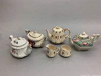 All four vintage English china items shown together on neutral background.
