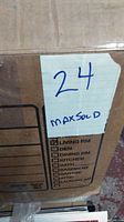 Box labeled with number 24 and MaxSold sticker
