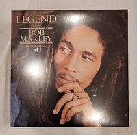 Front cover of the vinyl LP featuring Bob Marley's portrait, titled 'Legend the best of Bob Marley and the Wailers.'