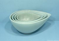 Nested view of four teardrop bowls