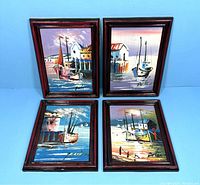 Four vintage nautical oil paintings displayed together, showing colorful boats and water scenes in small dark reddish frames.
