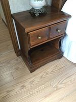 Pair of solid pine night stands shown with two drawers and open shelf