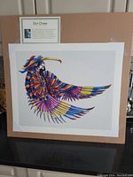 The lithograph mounted on cardboard with artist bio card visible, showing full artwork.