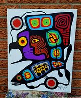 Clear view of the original acrylic painting titled 'Eagle Woman' with vibrant colors and abstract Woodland style elements, signed by artist Tim Tait.
