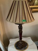 Full lamp with fabric shade showing overall design and height approximate 33 inches.