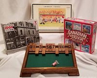 Looney Tunes puzzle, Canadian Tire store puzzle, Canadian Trivia game, handmade Shut the Box game with wooden numbered tiles and dice