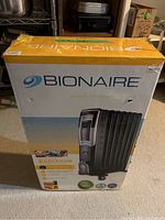 Boxed Bionaire radiator heater showing brand and product image