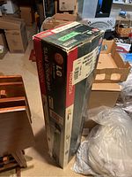 Box showing LG Slim Sound Bar NB2020A with original shipping label and packaging visible.