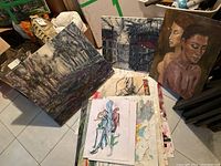 Group of paintings including landscape, portrait, and sketches with various sizes including up to 20x24 inches, displayed on floor and leaning against objects.