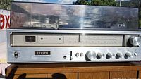 Front view of the Zenith stereo receiver showing the tuning dial, control knobs, and brand logo.