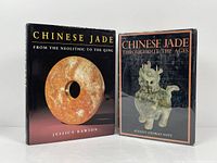 Two Chinese jade art books with front covers visible. The book by Jessica Rawson shows an orange jade bi disc, the other shows a green jade mythical creature.