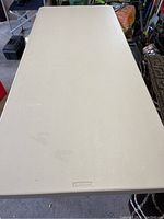 Full tabletop showing rectangular shape and beige plastic surface with Lifetime logo.