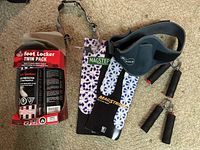 Photo showing Foot Locker sneaker protector twin pack, Magastrides insoles, hand strengthening grips, and yoga mat strap