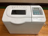 Front view of Black & Decker horizontal breadmaker showing lid and viewing window