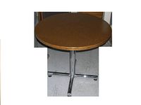 Photo showing 30-inch circular table with dark brown top and chrome metal base with four legs and casters.