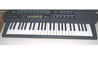 Front view of Concertmate 690 portable keyboard showing 44 keys, control buttons, and built-in speakers on both ends.