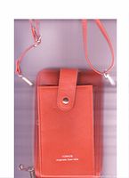 Front view of orange leather cell phone purse with shoulder strap, buckle closure flap, and printed brand name.