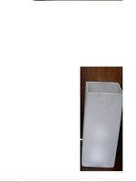 Side view of a rectangular frosted glass lamp with a modern design, opaque white finish.