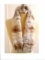 Wrap around fur collar on mannequin showing color and texture