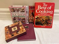 Books arranged on table showing covers including 'The Best of Cooking' and 'My Home-Made Tea Shop' box set plus wine books.