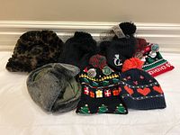 Full lot of 8 winter hats including faux fur, knit, Christmas and Disney beanies