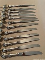 Multiple knives showing ornate handles in Northumbria pattern