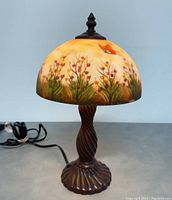 Full view of vintage 14-inch hand painted glass table lamp showing detailed floral and butterfly design with twisted fluted brown lamp base.