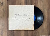 Gatefold album jacket of The Rolling Stones Beggars Banquet with noticeable wear and discoloration.