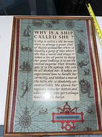 Full view of framed Irish Linen print 'Why Is A Ship Called She?' showing the map-like background decoration and text