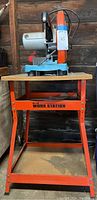 Full side view of Jepson 14-inch cut-off saw mounted on Brute Work Station stand