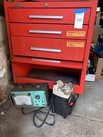 Front view of red Kennedy roller tool cabinet with three drawers