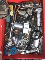 Drawer view showing assorted pneumatic tools including spray guns, die grinder, sander and blow gun