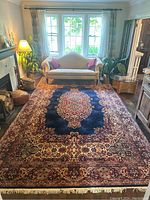 Full top-down shot of the entire rug laid out in a living room setting