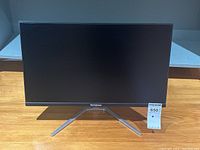 Front view of Westinghouse gaming computer monitor showing full screen and stand.