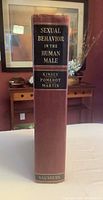 Spine showing title, authors, and publisher of the 1948 book Sexual Behavior in the Human Male