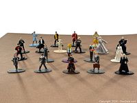 Front view showing 20 Harry Potter themed diecast figures in various character outfits and poses
