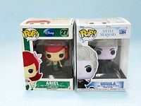 Lot of two Disney Funko Pop! figures in original boxes – Ariel #27 and Ursula #1364 from The Little Mermaid series.